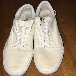 A nice looking pair of vans all white size 9.5